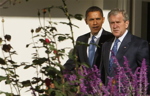 President Bush and President-elect Obama walk along the West Wing Colonnade of the White House in Washington, Monday, Nov. 10, 2008, prior to their meeting at the White House. (AP Photo/Charles Dharapak)